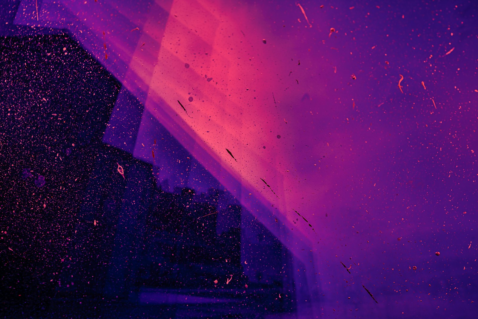 Beams of coloured light and particles in a light-art installation