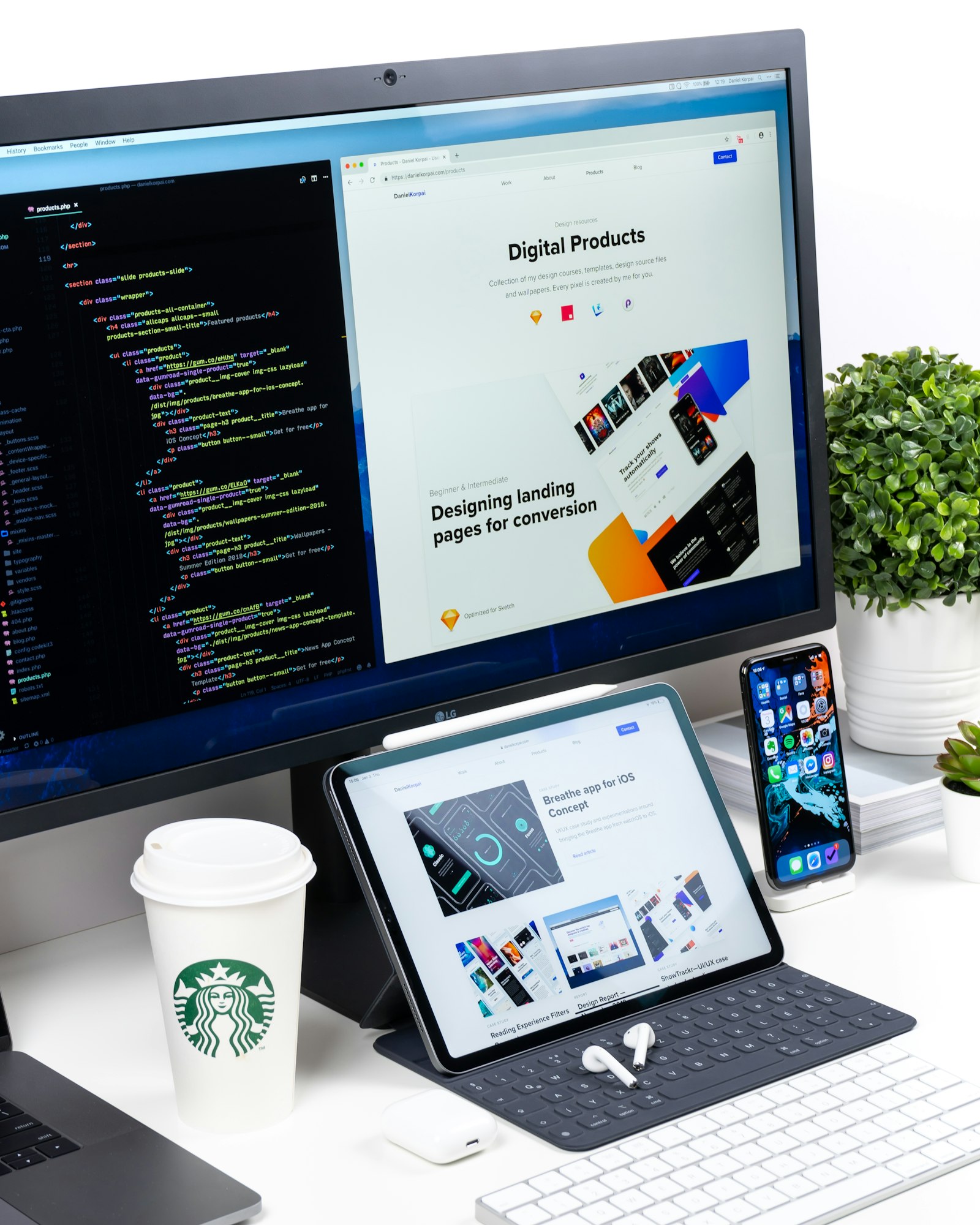 Web development workstation: code editor beside a live landing-page design, with tablet and phone previews